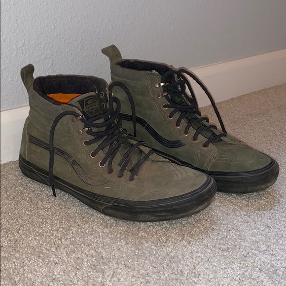 green and black high top vans